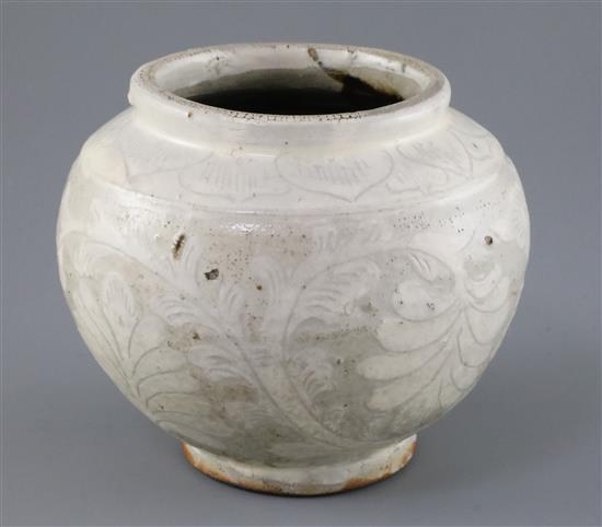 A Chinese Cizhou carved globular jar, probably Song-Jin dynasty H. 14.5cm, glaze imperfections